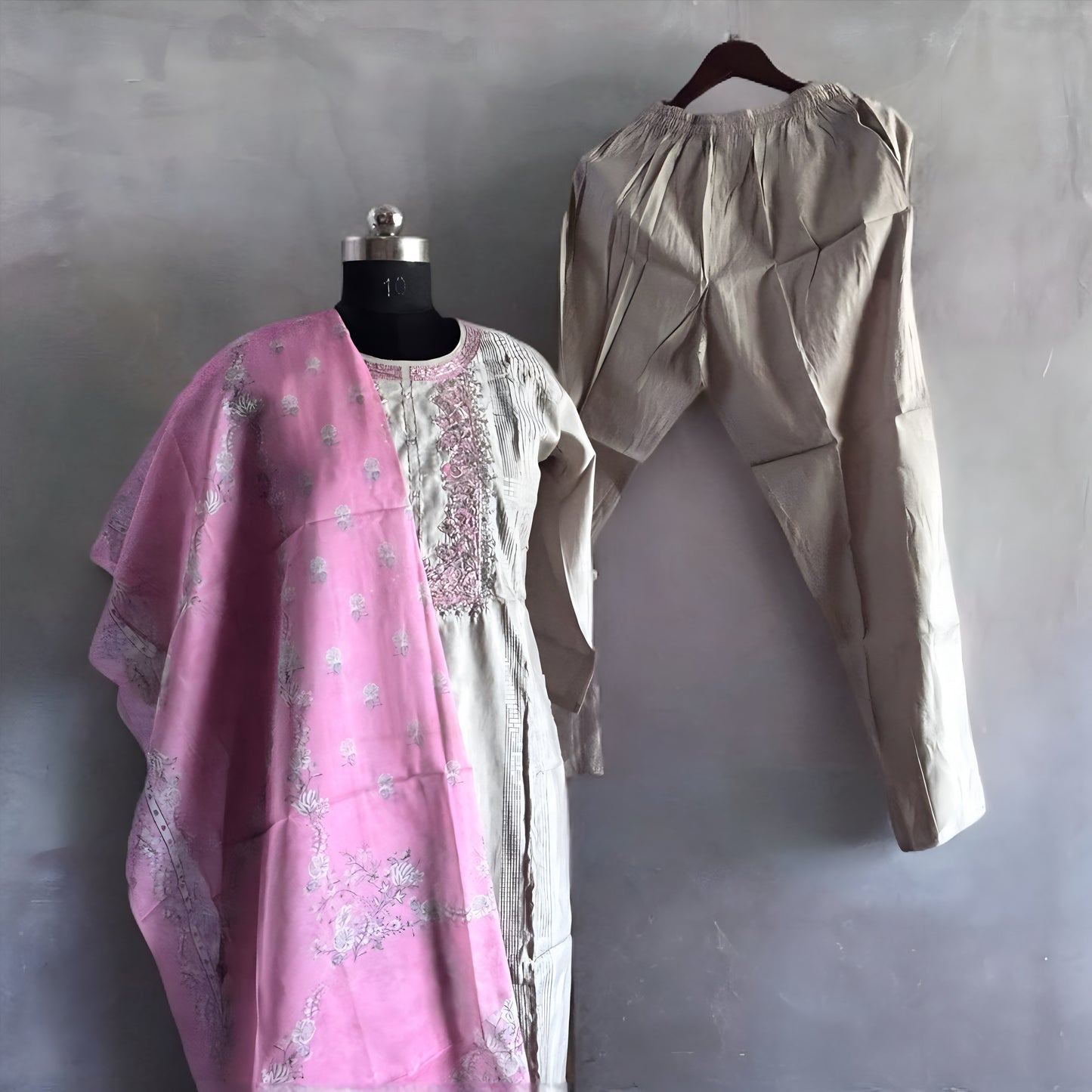 Silver Grey Roman Silk Salwar Suit with Contrast Pink Floral Dupatta & Embroidered Yoke