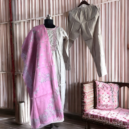 Silver Grey Roman Silk Salwar Suit with Contrast Pink Floral Dupatta & Embroidered Yoke